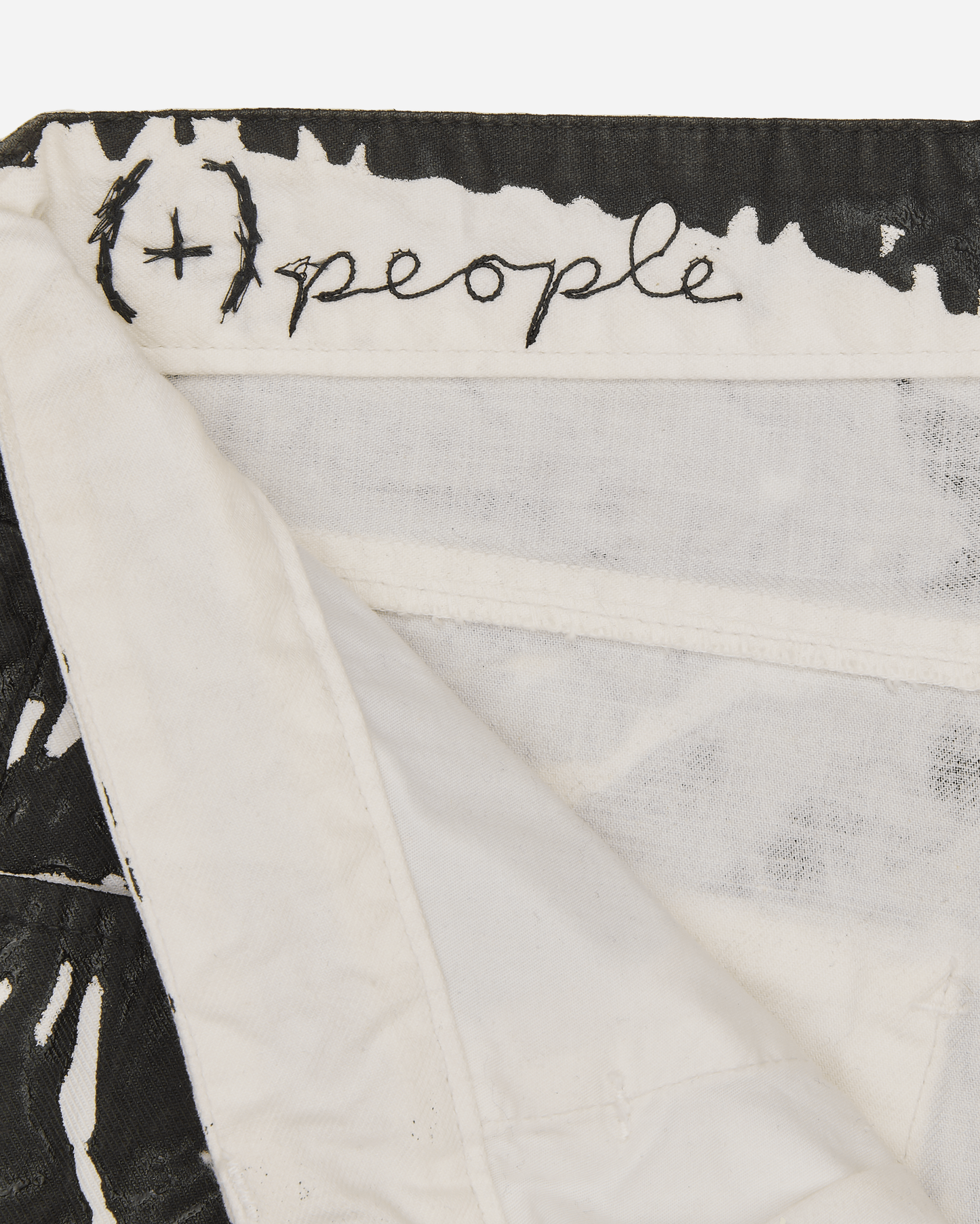 Paint Splatter Coated Denim Pants White / Black