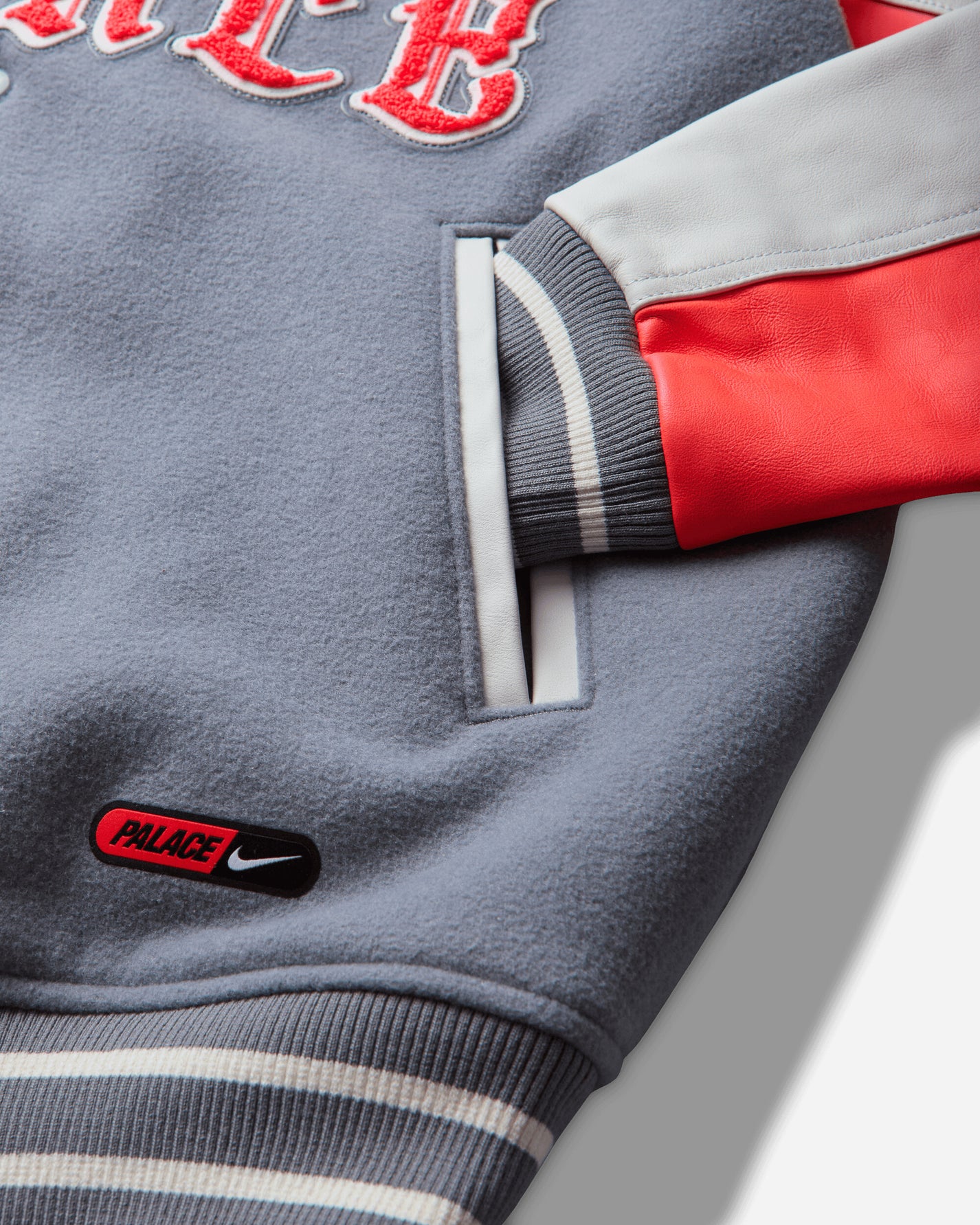 Nike Enx M Nk Awny Varsity Jkt Cool Grey/White/Bright Crimson Coats and Jackets Jackets IM6636-065