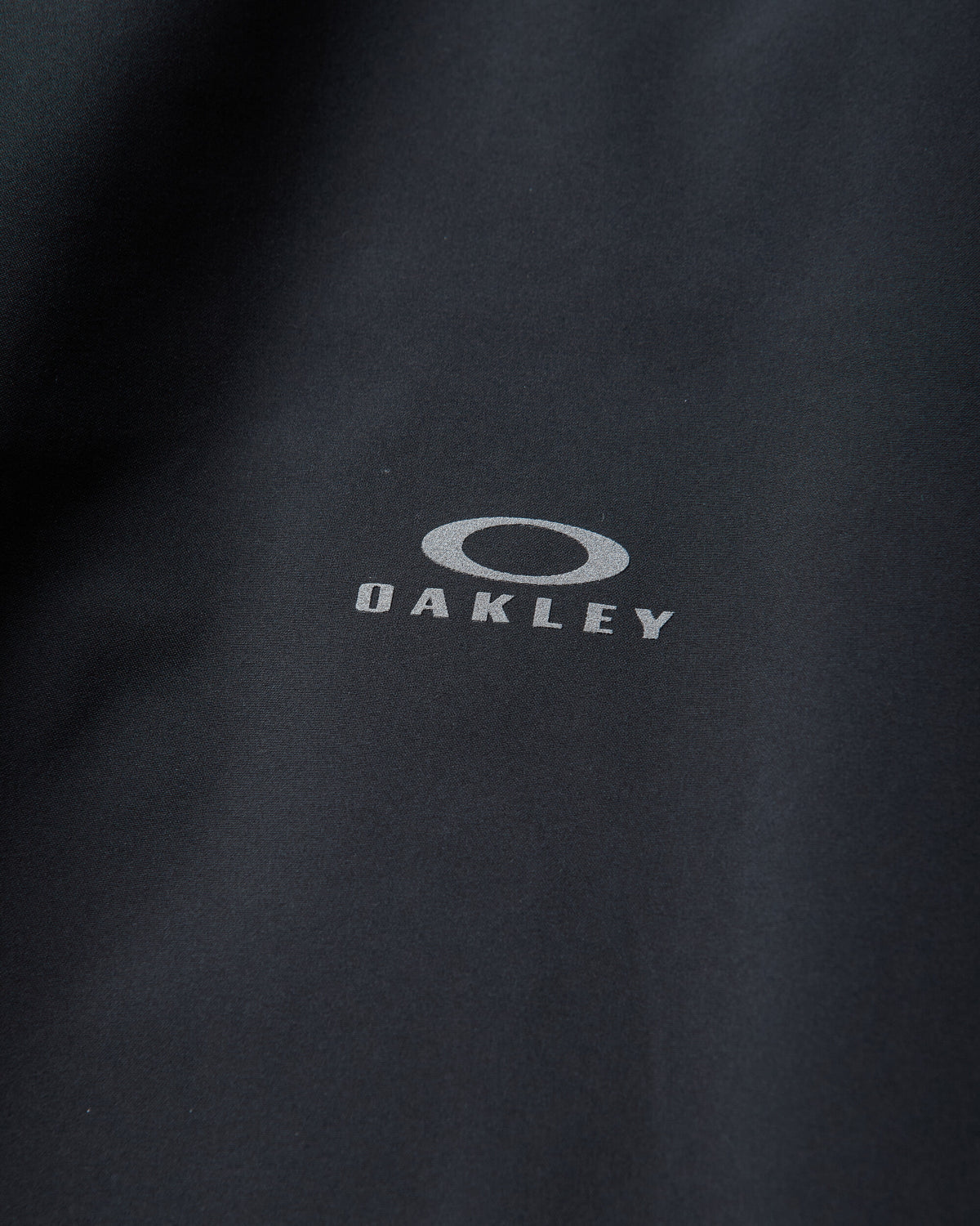 Oakley Latitude Veil Slingpack Jacket Pitch Black Coats and Jackets Jackets FOA407866 021