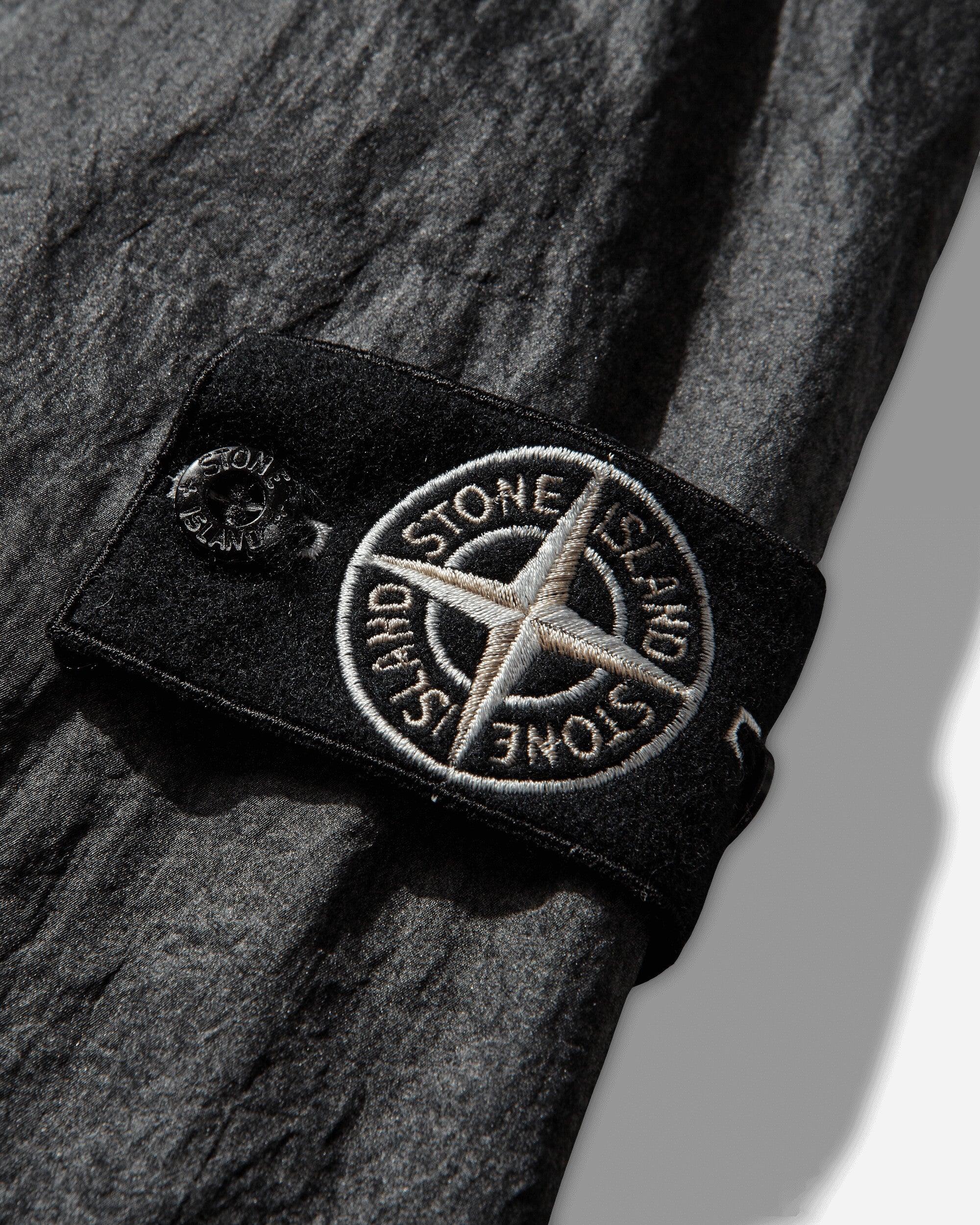 Stone Island Dense Nylon Tc Hand Sprayed Reflective Short Parka Black Coats and Jackets Jackets L1S154100072S0359 V0029