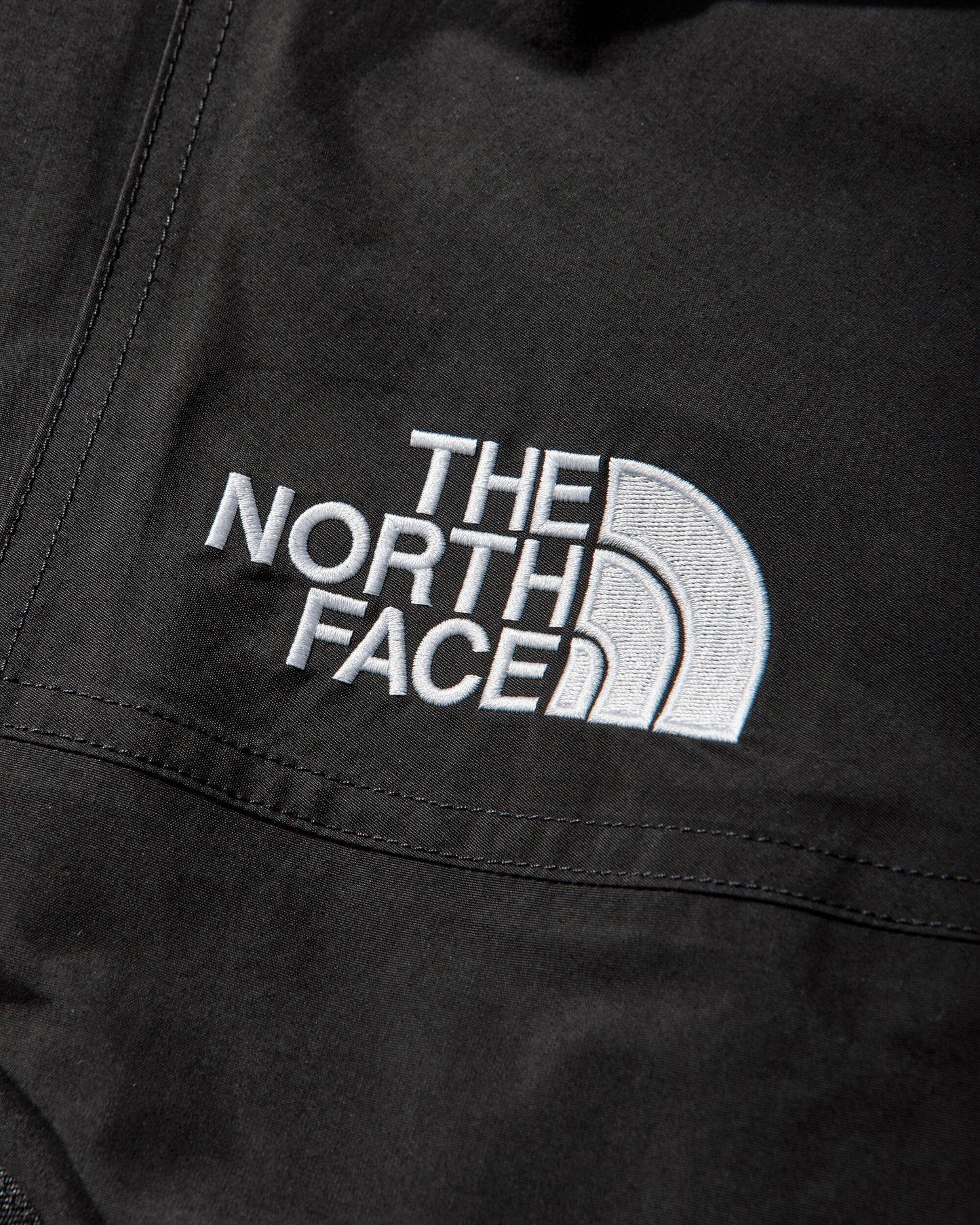 The North Face Tnf X Shf Mtn Jacket Black Coats and Jackets Windbreakers NF0A8HHKJK31 NFJK3