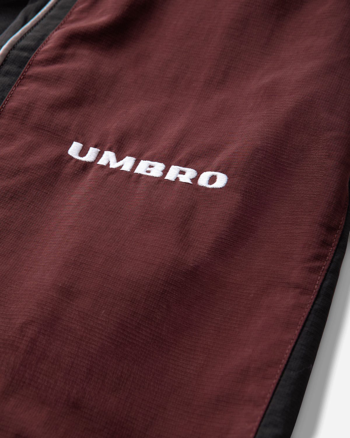 Umbro Bench Jacket Burgundy Carbon Black Coats and Jackets Jackets UBMW0648FA431 RED0009